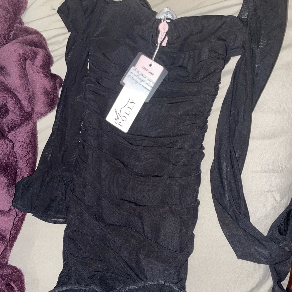Oh Polly black mini dress.